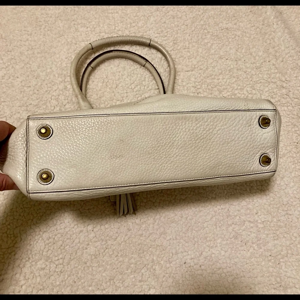 Coach Vintage pebbled white leather tassel bag